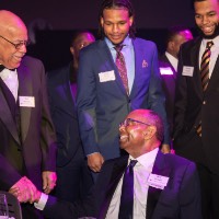 Guests greeting Bill Pickard at Enrichment dinner